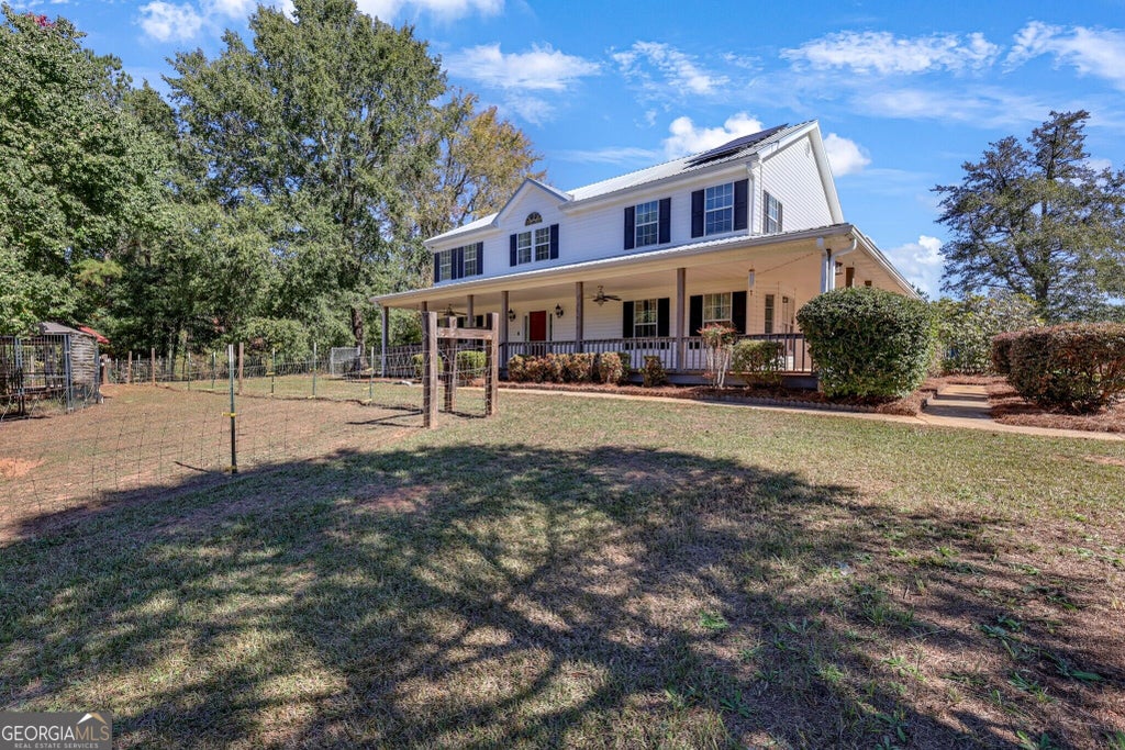 Photo of 1599 Lower River Road, Covington, GA 30016 (MLS # 10880825)