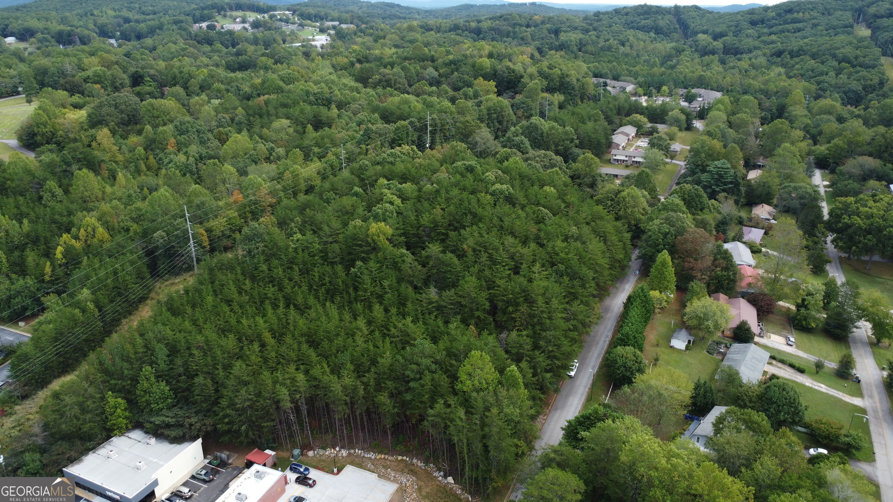 This is a rare find in the Cleveland City Limits! This 1.78 acre tract is located directly behind Waffle House, it is zoned R2. It is a clean slate ready for your plans!