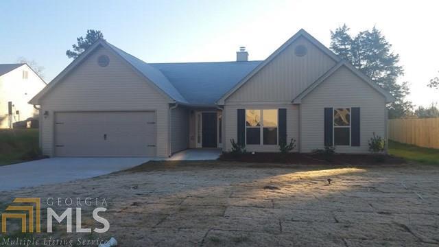Craftsman style ranch, 4 bedroom, 2 1/2 bath, arched doorways, stained kitchen cabinets, granite kitchen countertops, large kitchen island overlooking great room, walk in pantry, breakfast room, wall to wall carpet, hardwood floors in foyer, brick fireplace, large master suite w/ trey ceiling, master bath has separate shower and garden tub, walk in closets, patio, brick accent, 2 car garage, warranty, convenient to Hwy 316 & 81, home qualifies for 100% USDA Financing, seller will contribute up to $4000 towards closing cost w/ use of preferred lender only. Home is under construction. Photos are of home plan being constructed, not of actual subject property. Hannah Plan