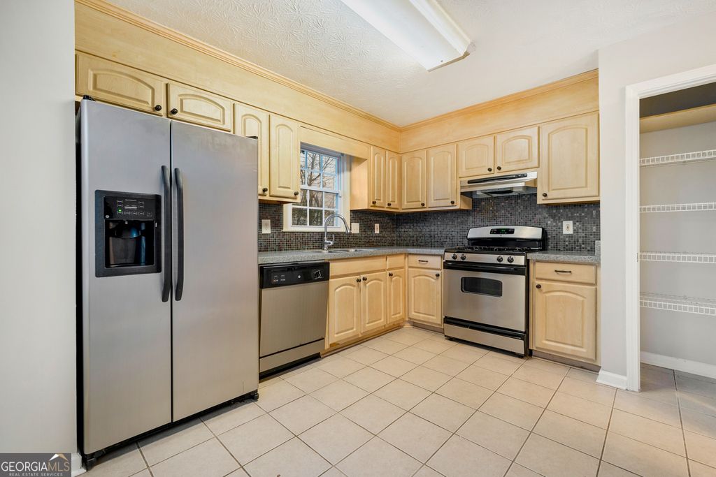 Photo of 2440 Windridge Drive NE, Conyers, GA 30013 (MLS # 10678634)