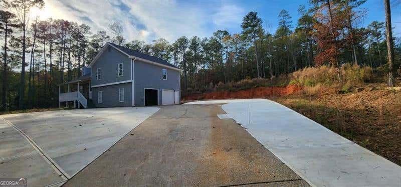 Photo of 4872 Lewis Road, Powder Springs, GA 30127 (MLS # 10792117)