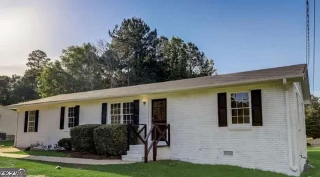 Photo of 1445 E Mcintosh Road, Griffin, GA 30223 (MLS # 10656802)