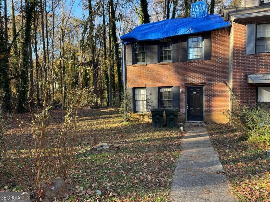 This full rehab project could be a charming 2-bedroom, 2.5-bathroom townhouse in Timber Creek Estates that offers a cozy and convenient living space. The home features a roommate-friendly floor plan, with each bedroom upstairs offering its own private bath and large walk-in closets.    Enjoy the privacy of a large fenced-in backyard and the additional storage space available. Located on a quiet cul-de-sac lot, this property is ideal for those seeking comfort and accessibility in a serene setting. Bring your contractors as this needs extensive work.