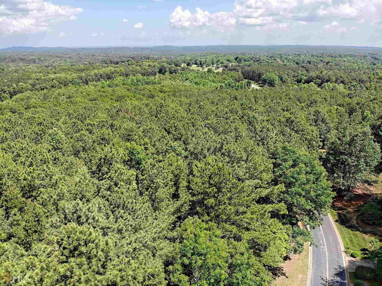 Gorgeous building lot with gentle topography in the beautiful Orchard Golf and Country Club. The Orchard G & CC is a top of the line, private, 18-hole golf course with driving range, clubhouse & pool.
