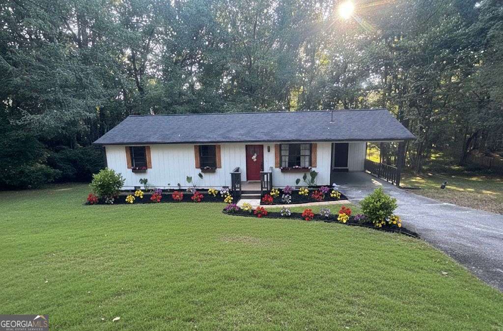 ARE THE HIGH INTEREST RATES STILL HOLDING YOU BACK? NO PROBLEM, THIS MOTIVATED SELLER IS WILLING TO CONTRIBUTE TO A 2/1 RATE BUY DOWN TO HELP WITH THOSE HIGH MONTHLY PAYMENTS! Beautifully RENOVATED RANCH-STYLE HOME in Powder Springs! This charming 3-bedroom, 2-bathroom ranch-style home has been updated, offering a stylish and low-maintenance living experience. With a BRAND-NEW ROOF, fresh interior and exterior paint, and modern finishes throughout, this home is MOVE-IN READY! Inside, the open-concept layout maximizes space, creating a bright and inviting atmosphere. The NEWLY REMODELED KITCHEN boasts white cabinetry, quartz countertops, a spacious island, and NEW stainless steel appliances, making it the heart of the home. Thoughtful upgrades, including NEW light fixtures and updated outlets, add a modern touch. This home is designed for efficiency and comfort, with a dedicated storage room providing extra space for organization. Nestled on a generous lot, it offers privacy while being conveniently close to parks, schools, and shopping. DON'T MISS OUT ON YOUR OPPORTUNITY TO BECOME A HOMEOWNER NOW AND START BUILDING EQUITY WITH THIS MOVE-IN READY GEM! Schedule your private showing today and discover all it has to offer! *Seller incentives apply to a full price offer*