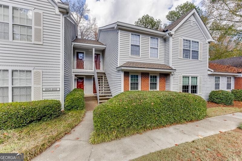 ***As of Jan 2025, there are 2 landlord permits open***Immaculately Maintained Condo in the Sought-After Alpharetta High School Cluster, located in a SWIM/TENNIS community. This home is move-in ready, featuring numerous recent upgrades that will impress at every turn. NEW WINDOWS throughout the condo enhance energy efficiency and aesthetics. Hardwood Floors in the main living areas. REMODELED Kitchen includes newer cabinets, granite countertops, and stainless-steel appliances, including a gas range, French-door refrigerator, dishwasher, and microwave. Spacious Bedrooms feature ceiling fans, each with their own private, remodeled bathrooms featuring luxurious walk-in TILED showers with FRAMELESS glass doors, upgraded vanities, mirrors, and light fixtures. The primary bedroom boasts DOUBLE closets for added convenience. Laundry Closet comes complete with a WASHER & DRYER. Relax on the private balcony, with outdoor plastic flooring that overlooks lush greenery, providing the perfect spot for unwinding. The location is unbeatable-just minutes from Windward Parkway, Highway 400, Highway 9, schools, parks, shops, and so much more. Enjoy the convenience of being ONLY 2 MILES from Downtown Alpharetta & 1.7 from AVALON mall!
