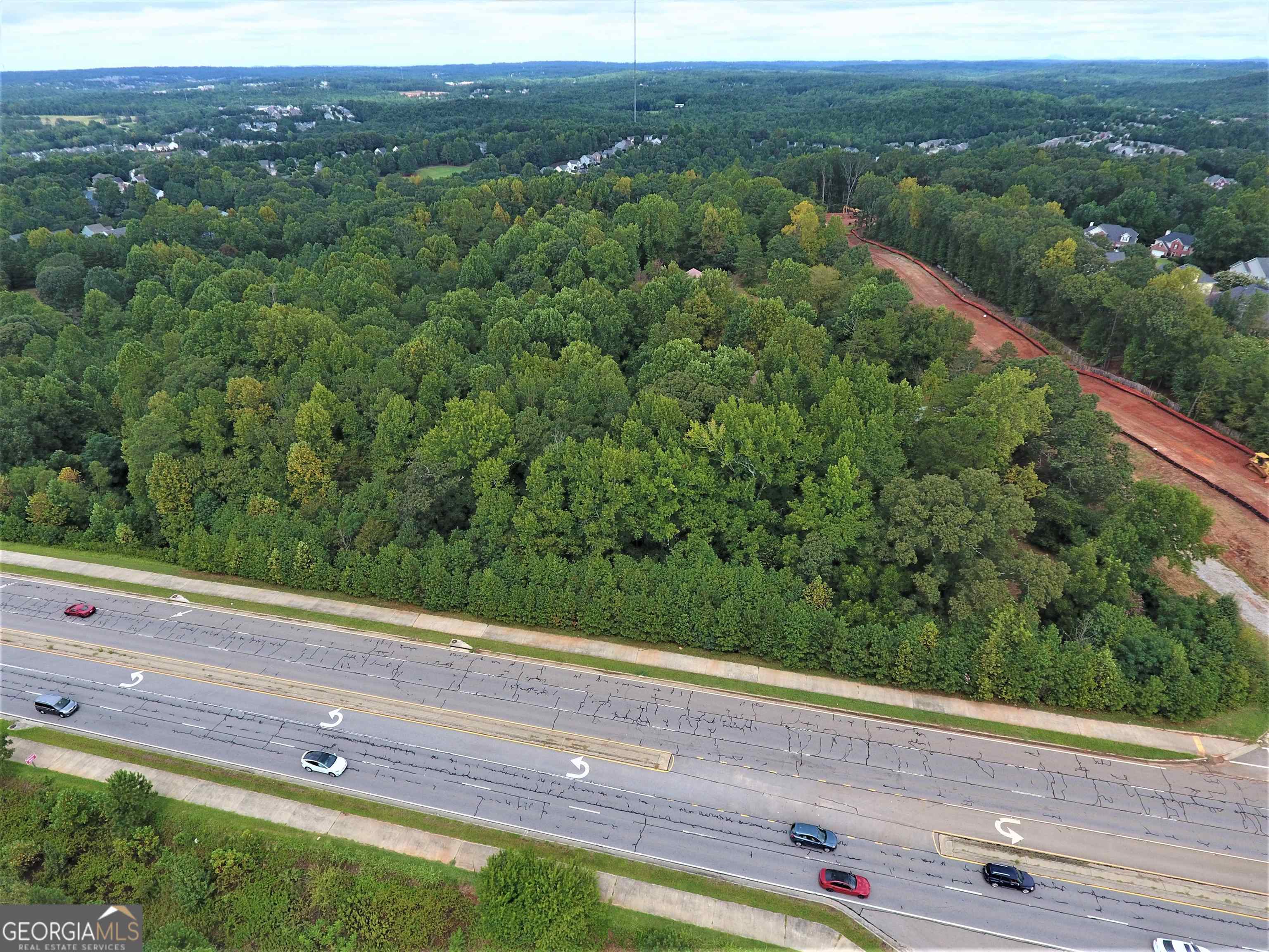 POTENTIAL COMMERCIAL! 17.675+/- acres now available in rapidly growing south Hall County along the 4-lane GA 347/Friendship Rd mixed-use corridor! Ideally situated between commercial/retail on Spout Springs Rd and Hwy 211, and only a mile from the Northeast Georgia Medical Center's Braselton campus and surrounding medical offices and facilities. This property is also in close proximity to residential developments, including apartments, active-adult and assisted living. Three residences are located on this property, but the value is in the land, which ideal for redevelopment to commercial or mixed use. With rolling to sloping topography, over 600' of frontage lies in the Hall Gateway District, an aesthetically appealing corridor featuring golf cart paths and architectural requirements along a stretch of GA-347. This is a 4-6 lane highway with concrete median connecting I-985 to GA-211 for access to I-85, including a median break in front of property. The area offers plenty of restaurants, grocery, golfing and the highly acclaimed Chateau Elan Hotel and Conference Center. Current zoning is Agriculture Residential IV district. Water, electric and gas are available at site. Sewer can be available by easement. A drafted update to the Comprehensive Plan is currently under consideration that, if approved, would place this property within a Business Node and Corridor. *OCCUPIED* - Do not enter property without appointment.