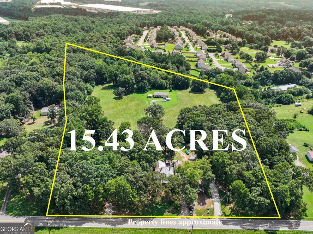 Rare opportunity to add a prime 15-acre property to your investment portfolio or development pipeline. Located on the border of the city, this property offers immediate rental income and long-term potential. **Property Highlights:** - **3 Rental Homes:** Currently generating $5,500+ in monthly income - **Utilities:** Water available; sewer at back of property - **Natural Feature:** Small lake on-site, adding aesthetic and recreational value - **Already Subdivided:** 4 parcels total - selling together preferred - **Zoning/Development Potential:** Ideal for investors or developers seeking a large tract with existing income **Important Notes:** - DO NOT DISTURB TENANTS - Property shown by appointment only - Tenants require 60 days' notice to vacate after closing - Access only permitted with an agent This is a unique chance to secure a large, versatile tract with immediate income and multiple future use options. Contact the listing agent for more details or to schedule a showing.