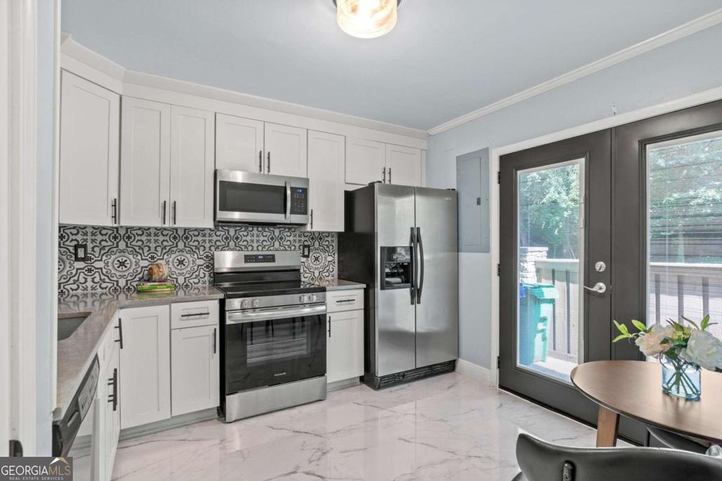 Photo of 1260 Druid Knoll Drive NE, Brookhaven, GA 30319 (MLS # 10677631)