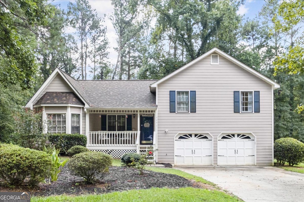Incredible Value in Powder Springs! This 4-bedroom, 2-bathroom split-level home offers a fantastic opportunity. The inviting covered porch provides the perfect spot for your morning coffee or evening relaxation. Inside, you'll find a spacious sitting room with a cozy wood-burning fireplace, creating a comfortable atmosphere for winding down after a long day. Step outside, and you'll discover a tranquil, fenced backyardCoa private oasis to enjoy nature or host gatherings. The property has been upgraded with a new roof and durable Hardie Plank siding. Plus, there's a deck already in place, designed for a hot tub, adding to the potential for outdoor enjoyment. This home is your canvas to customize with your choice of paint and flooring, making it truly your own. Whether you're looking to build sweat equity or searching for a smart investment opportunity, this property is perfect for you. And the best part? No HOA fees to worry about. Act quickly to seize this incredible value!