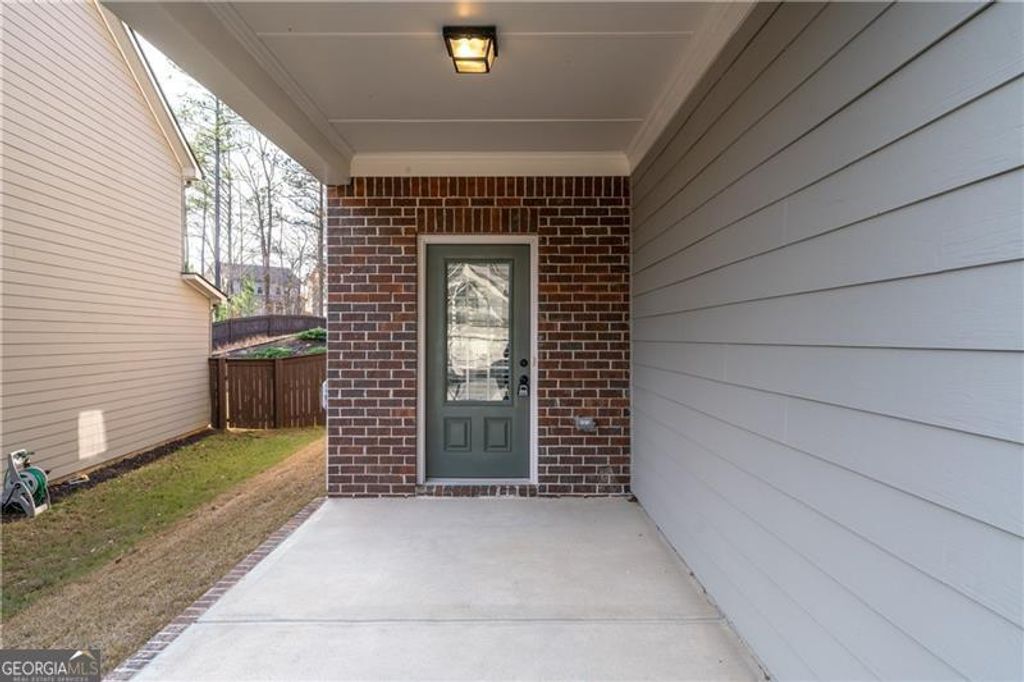 Photo of 3244 Hawthorne Path, Braselton, GA 30517 (MLS # 10661531)