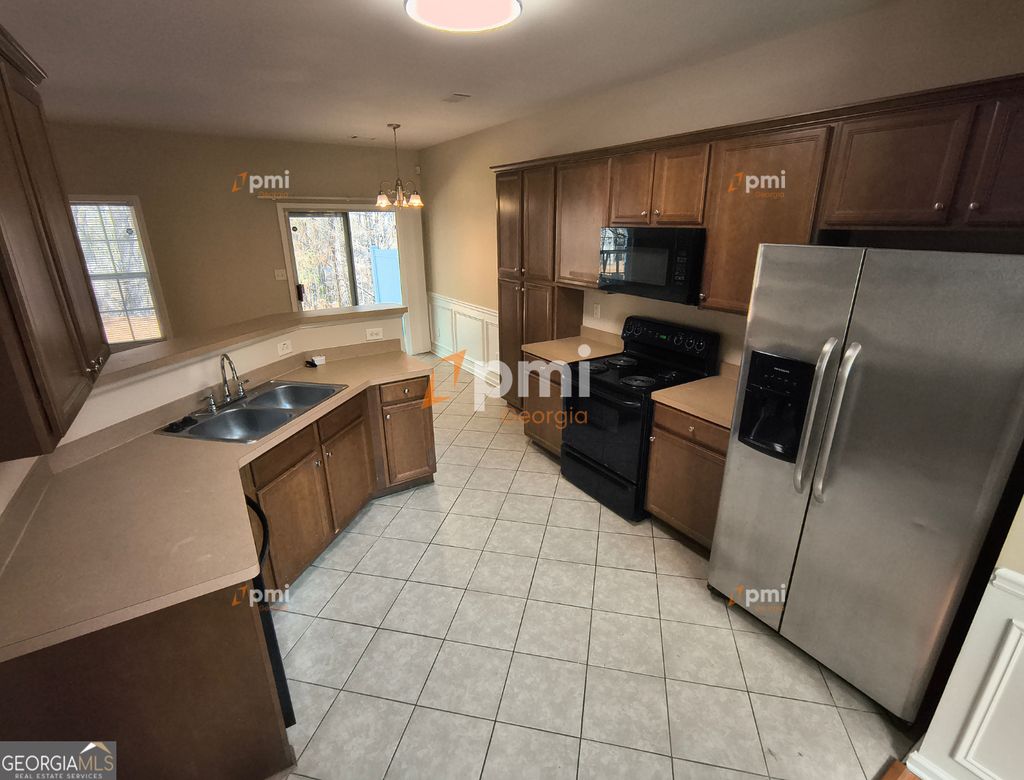 Photo of 306 Creek Manor Way, Suwanee, GA 30024 (MLS # 10703994)