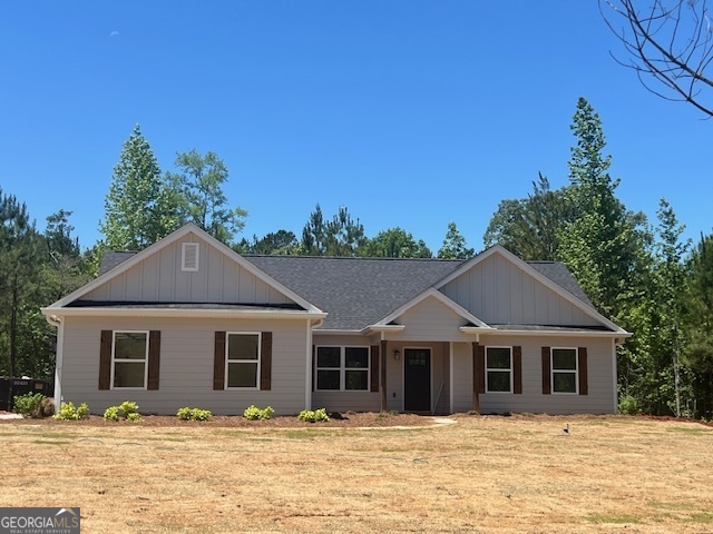WOW! Beautiful new construction home on 2.01 wooded and private acres. Desirable open floorplan with all bedrooms on the main level. The spacious vaulted great room is open to dining area and island kitchen with quality wood cabinets, granite countertops, and recessed lighting. The primary suite includes a vaulted ceiling, 2 walk-in closets, large tiled shower, and dual vanities while secondary bedrooms are spacious with a full guest bathroom close by. Standard features include LVP flooring throughout, ceiling fans in all bedrooms, tongue/groove ceilings on covered front & back porches, granite counters, and designer lighting. Home is close to completion and all selections have been chosen and ordered.