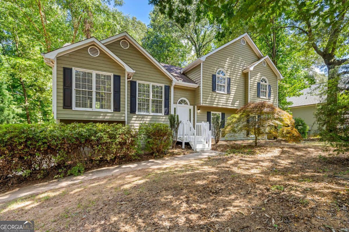 Welcome to 5065 Doubletree Dr in desirable Cumming, GA! This lovely home features: - Extended driveway for ample parking - Open concept living room and dining room, perfect for entertaining - Gourmet kitchen with stainless steel appliances and granite countertops - Spacious den for relaxing or additional living space - Luxurious master bathroom with double vanity, separate shower, and soaking tub - Private fenced backyard with deck for outdoor enjoyment Located in a quiet neighborhood, this home offers the perfect blend of comfort and style. The open floor plan and updated kitchen make it ideal for both everyday living and hosting gatherings. Unwind in the large den or enjoy outdoor living on the deck overlooking the fenced backyard. With its prime location in Cumming and attractive features, this home won't last long on the market. Schedule your showing today!