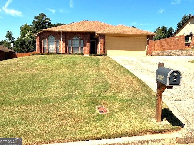 Lovely 3 bedroom ranch, hardwood floors. Elegant louvers shutters set in solid wood frame, allowing control over light, privacy and air flow. Double vanity and soaking tub in owner suite. Dining area and separate breakfast area allows for plenty entertainment. Beautiful backyard, covered patio. Fenced in backyard great for privacy and entertaining guest. Must see you will absolutely love it. Nearby shopping and public transportation.