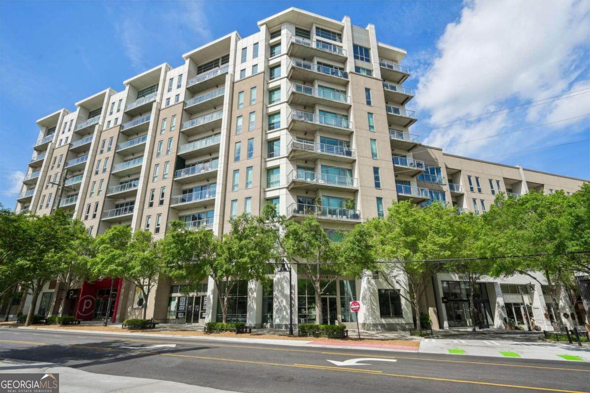 Step into this serene, light-filled 1-bedroom, 1-bath condo in the heart of West Midtown - where "Location, Location, Location" becomes your everyday reality. Live steps from Atlanta favorites like Perrine's Wine and Marcel, all along the iconic Howell Mill stretch. Walkability Unreal. Vibe 100% authentic. Inside, hardwood floors, a galley-style kitchen, and floor-to-ceiling windows bring effortless style and natural light. The seller invested over $30,000 in upgrades, including a marble-tiled spa shower, double showerheads, fresh paint, and refinished floors - it's truly move-in ready. White Provision amenities include: Concierge service, Resort-style west-facing pool, 24/7 fitness center, gas grills, fire pit, guest parking, gated garage with your own covered, same-floor spot (no elevators needed); minutes to Midtown, Buckhead, I-75/I-85, Georgia Tech, and top parks - plus the Beltline expansion is right around the corner. This isn't just a condo - it's the West Midtown life. Come see it. Feel it. Fall in love.