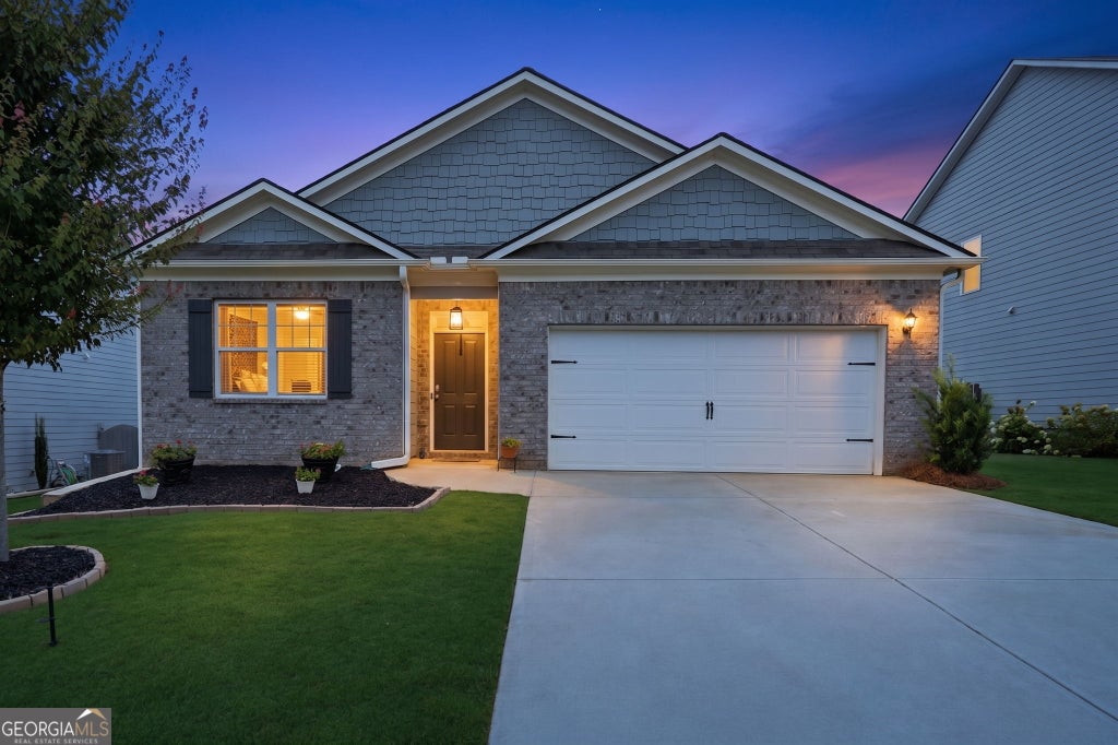Photo of 450 Starbuck Parkway, Pendergrass, GA 30567 (MLS # 10835385)