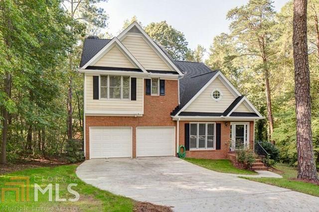 100% move-in ready & just waiting for your family! BRAND NEW 30-YR ROOF! Chef-friendly kitchen has new granite, new tile, new backsplash, new hardware, large walk-in pantry, tall 42" cabinets & a perfect view of the fireside family room! New flooring & paint throughout the home! Large master suite w/new tile flooring in master bath! Finished basement w/full bath & new flooring! New garage door openers! Close to Lake Lanier! Will soon be surrounded by new high-end homes, which is sure to increase the value quickly! Gorgeous home, excellent location, NO HOA!!