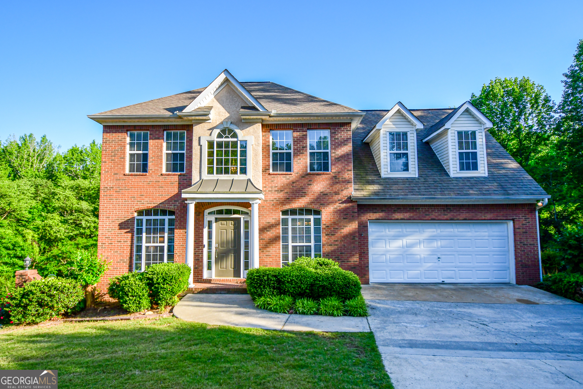 Welcome to your dream home in the sought-after Stonebriar neighborhood of Fayette County. Nestled at the end of a peaceful cul-de-sac, this stunning two-story residence offers the perfect blend of privacy and charm-complete with a beautifully wooded backyard and a spacious two-level deck ideal for entertaining. Inside, you'll find an inviting kitchen and family room combo that opens to a cozy screened-in porch, perfect for savoring a morning coffee or winding down with a glass of wine, rain or shine. The fully finished basement is ideal for guests or in-laws, featuring its own bedroom, office, kitchenette, living area, and direct access to the lower deck with serene backyard views. Don't miss your chance to own this exceptional home-schedule your showing today! OPEN HOUSE, Sunday, 2-5:00pm. *Motivated Seller*. Call today and Ask us about the seller paid closing cost.