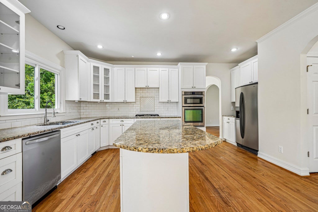 Photo of 5156 Broadgreen Drive, Peachtree Corners, GA 30092 (MLS # 10871685)