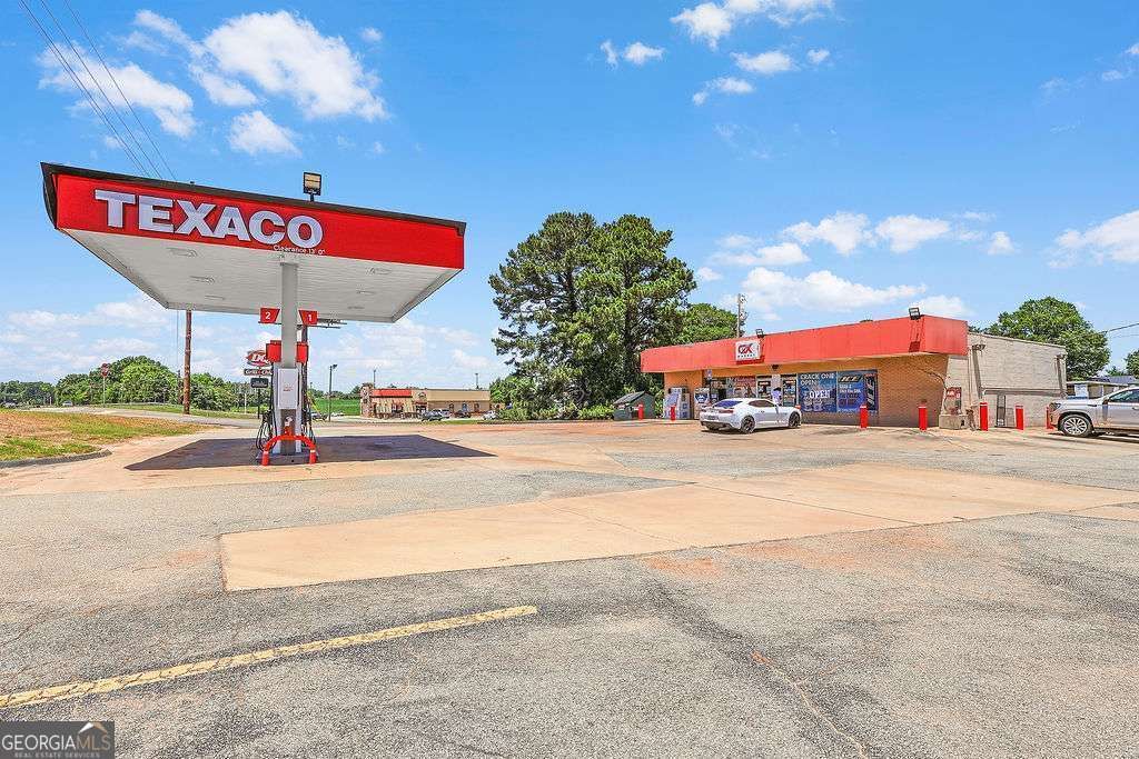 Photo of 201 Us-1-Byp N, Louisville, GA 30434 (MLS # 10769961)
