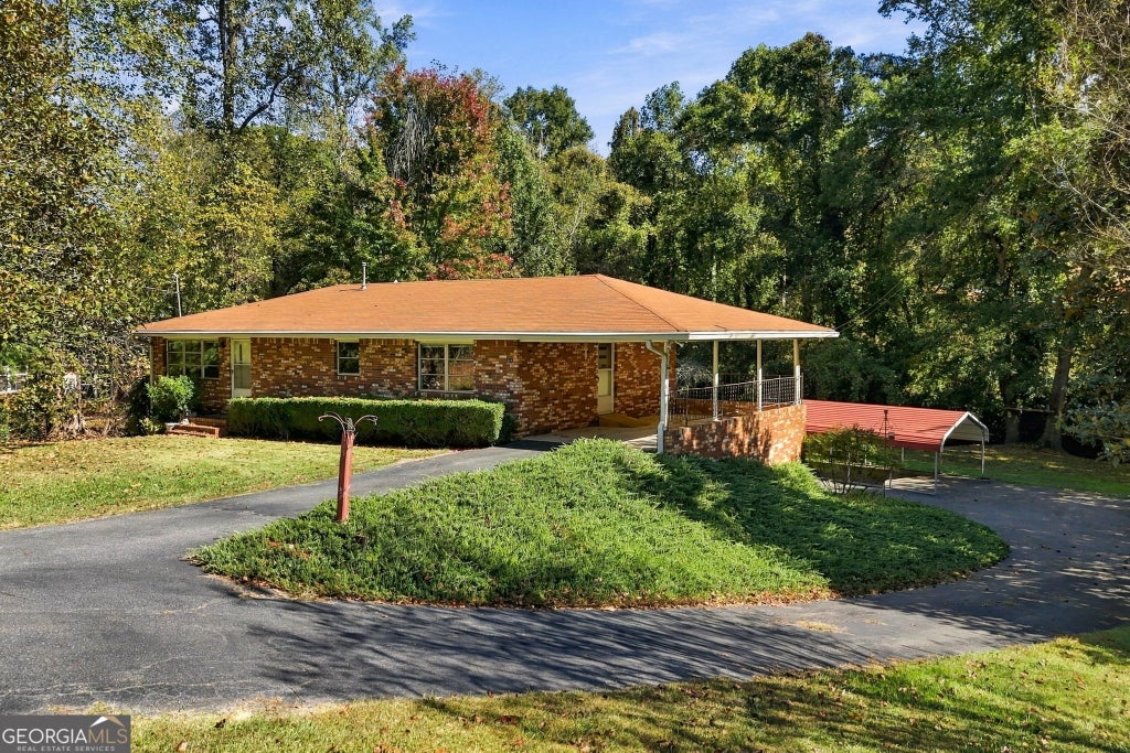 Photo of 314 Shoal Creek Road, Canton, GA 30114 (MLS # 10881687)