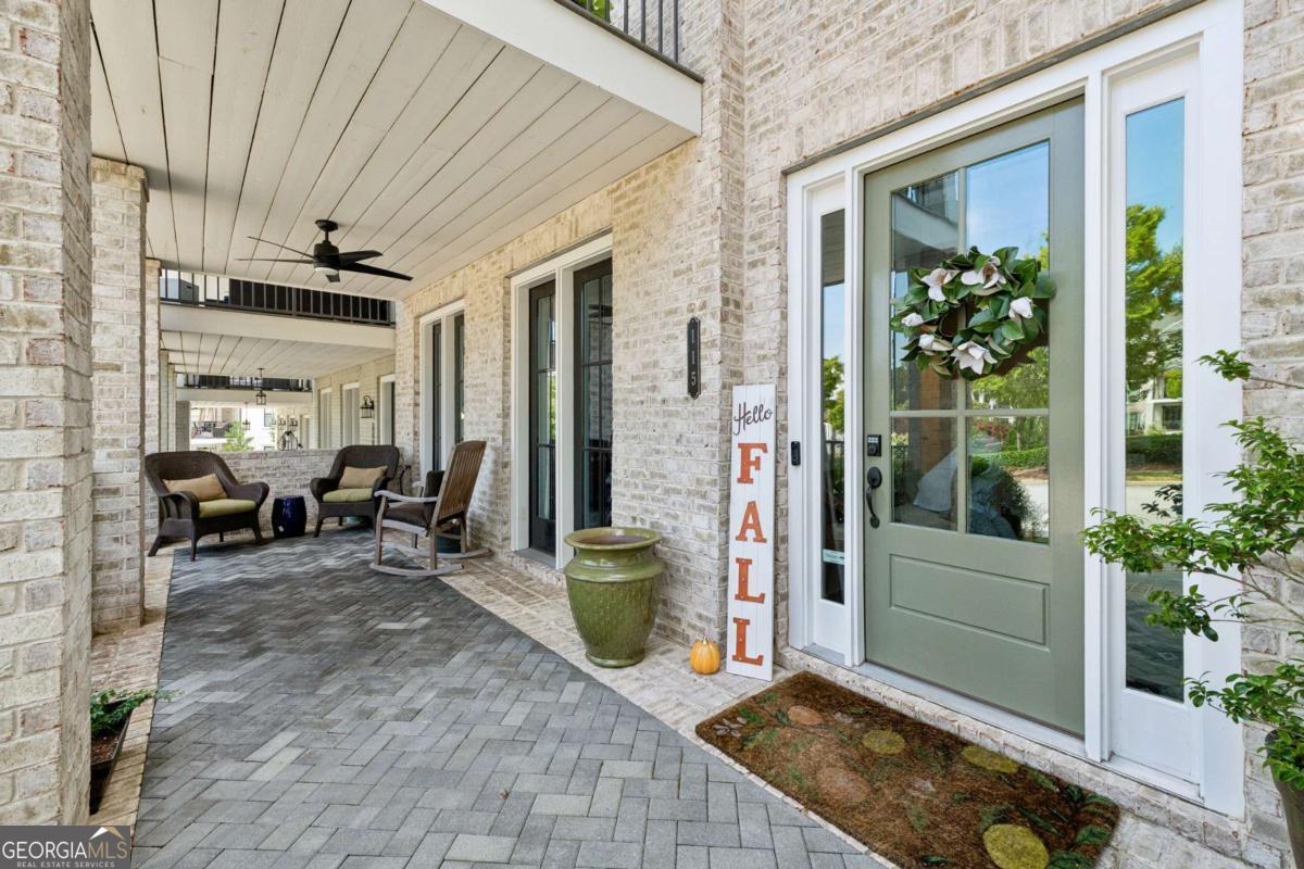 Experience sophisticated living in the heart of Roswell at 115 Harlow Circle, a premier residence in the coveted Harlow West community and the largest floor plan offered-price starting well below appraised value. This 3,000+ sq. ft. Charleston layout blends open-concept design with elevated finishes, featuring a chef's dream kitchen with quartz countertops, oversized island, farmhouse sink, upgraded appliances, and designer backsplash; fireside family room, keeping room, and breakfast nook opening to a covered patio; spa-inspired primary suite with walk-in shower and custom closet; and a flexible lower-level guest suite or office. Enjoy outdoor charm with three inviting porches, plus thoughtful upgrades including surround sound, enhanced security, and an elevator-ready shaft for future installation. Harlow West offers resort-style amenities such as a clubhouse, two pools with cabanas, tennis and pickleball courts, dog park, green spaces, and walking trails-all just minutes to Avalon, Downtown Alpharetta, Downtown Roswell, GA-400, and within walking distance to the Ameris Bank Amphitheatre. Don't miss this rare opportunity to own one of Roswell's most desirable townhomes-luxury, convenience, and unbeatable value all in one.