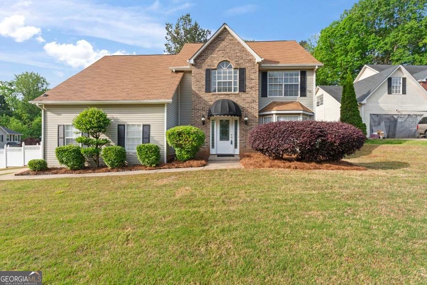 What A Beauty!! Exquisite Renovations. Walk onto the elegant tile in entrance foyer and formal Living Room; could be used as an in home Office, or extra bdrm. with a few modifications. Followed by a separate Dining Room, and all white kitchen to your left, includes hints of teal, blue and silver backsplash. Views to the Eat in Area and Family Room fire place. Walk outside into an Entertainer's Paradise. Large covered all Stone patio with arched entry ways and views to the stone Waterfall. You'll feel like you are in Greece or Rome with the amenities that backyard offers! 16 to 17 miles to Hartsfield Airport and Downtown Atlanta. You don't want to miss the chance to view!