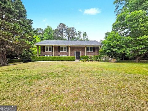 Photo of 644 Noell Way NW, Lilburn, GA 30047 (MLS # 10741140)