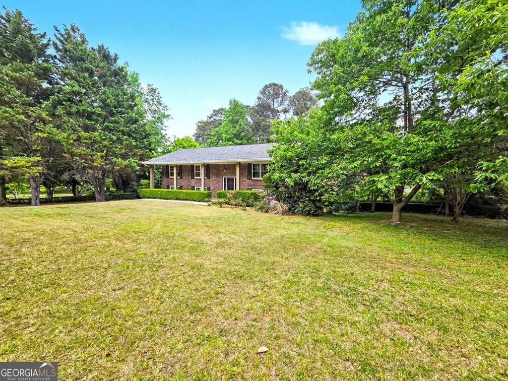 Photo of 644 Noell Way NW, Lilburn, GA 30047 (MLS # 10741140)