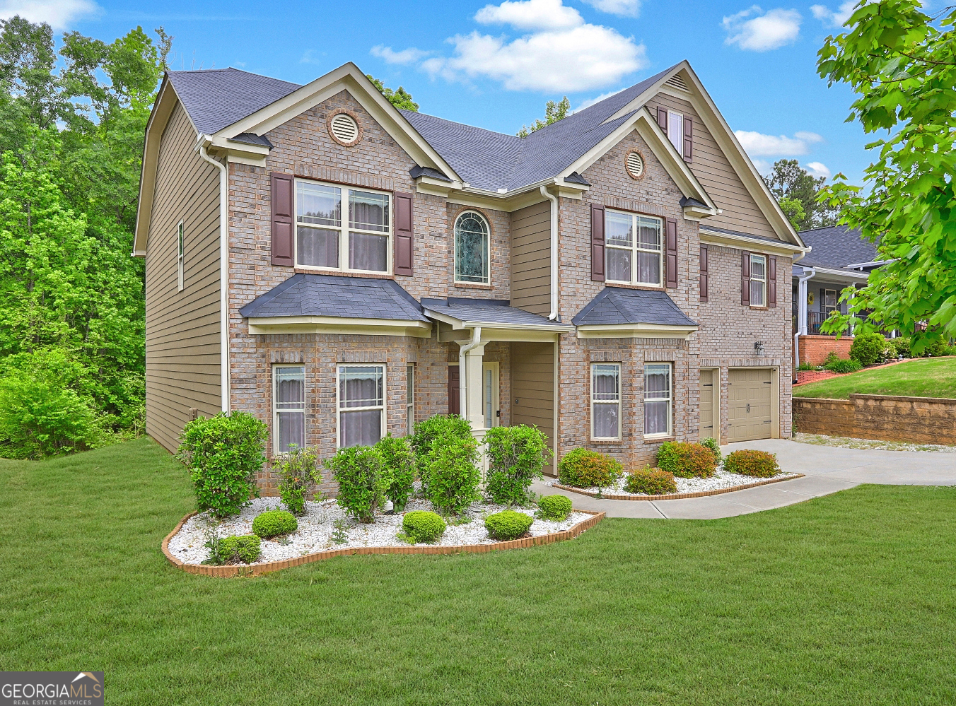 Welcome home to 5280 Clingman Court. This impeccable 5 bedroom home with AIR FILTRATION AND WATER PURIFICATION SYSTEM throughout the home is amazing. Step inside to discover the grandeur of the main living area, featuring a spacious two-story great room, elegant dining room, versatile living room/flex space, a comfortable guest bedroom and full bathroom. The heart of the home, the kitchen is a chef's dream, featuring a large island perfect for seating, granite countertops and an open layout, providing views to the two-story great room with fire place. Retreat to the serene ambience of the primary suite located upstairs complete with grand master bath, dual vanities, and a generous large walk-in closet. The secondary bedrooms are just as spacious and bright with several boasting their own ensuite bathroom and walk-in closet. Every detail compliments this home, from the wrought iron stair rails to the high ceilings. Home is located in a swim tennis community. Plus, for travelers, Harts field-Jackson Atlanta International Airport is 15-20 minutes away, ensuring easy access to the world. Seller is offering closing cost plus it qualifies NO money down 100% financing! So bring your buyers over to view TODAY!
