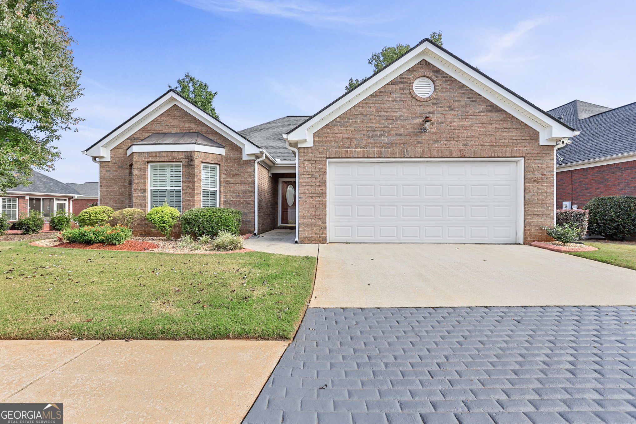 Charming Three-Bedroom Ranch in a 55+ Community! Clubhouse, park and walking trails. This inviting three-bedroom, two-bath ranch home offers the perfect balance of comfort and convenience. Designed with an open floorplan, the living, dining, and kitchen areas flow seamlessly together, creating a spacious environment ideal for both everyday living and entertaining. The thoughtfully designed primary suite provides a private retreat with an en-suite bath and generous closet space, while two additional bedrooms offer flexibility for guests, a home office, or hobbies. Located in a desirable 55 and older community, residents enjoy a low-maintenance lifestyle, with exterior upkeep and landscaping taken care of-leaving more time to enjoy life as you desire it! Whether relaxing in the airy living spaces, entertaining friends, this home makes it easy to embrace a simpler, more enjoyable lifestyle. Your new home is minutes away from the historic downtown McDonough Square. Restaurants, quaint shops, and entertainment in the square await you!