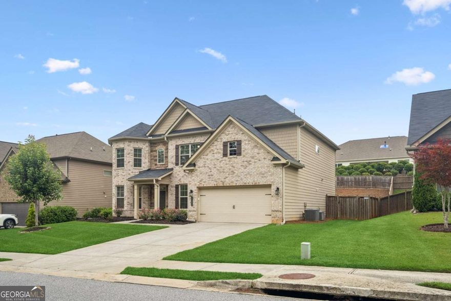 Move-in ready home in desirable North Forsyth! This beautiful 5-bedroom, 4-bath home offers an open-concept layout perfect for modern living. Built in 2017, it features a bright and spacious kitchen that flows seamlessly into the family room - ideal for entertaining. Fresh interior paint throughout makes it feel brand new! A convenient main-level bedroom and full bath are perfect for guests or a home office. Upstairs, you'll find a large owner's suite and generously sized secondary bedrooms, each with its own designated bathroom. Step outside to a great backyard - perfect for relaxing, playtime, or gatherings. Enjoy North Forsyth living with easy access to top-rated schools, parks, and shopping.