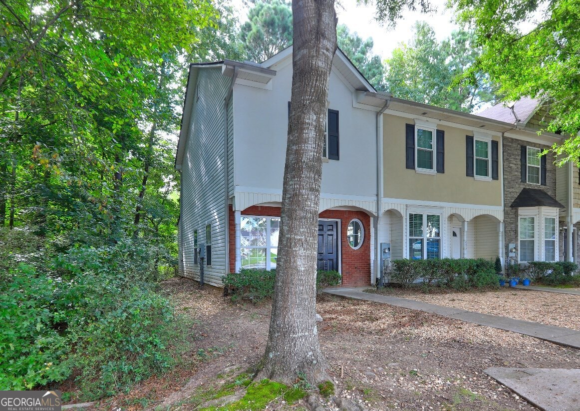 End-unit townhome on a quiet cul-de-sac in sought-after Camden Forrest! Light-filled main level with open living/dining that flows to a private patio-great for relaxing or entertaining. Spacious kitchen with good storage overlooks the living area. Upstairs you'll find two generous bedrooms, each near a full bath-ideal roommate layout. Laundry on main, assigned parking, and low-maintenance exterior. Minutes to schools, shopping/dining, and major highways-with easy access to Hartsfield-Jackson. Move-in ready and perfect for owner-occupant or investor. Bedrooms are upstairs. 2 bed / 2 bath. End unit.