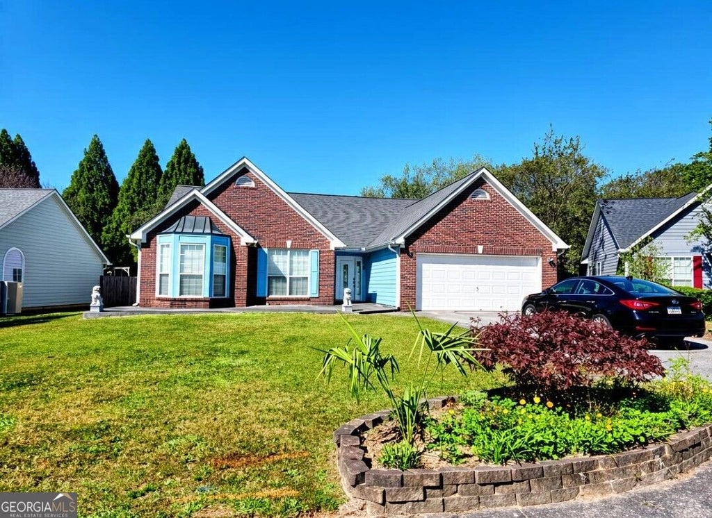 Photo of 329 Sunnyside Court, Lawrenceville, GA 30044 (MLS # 10878749)