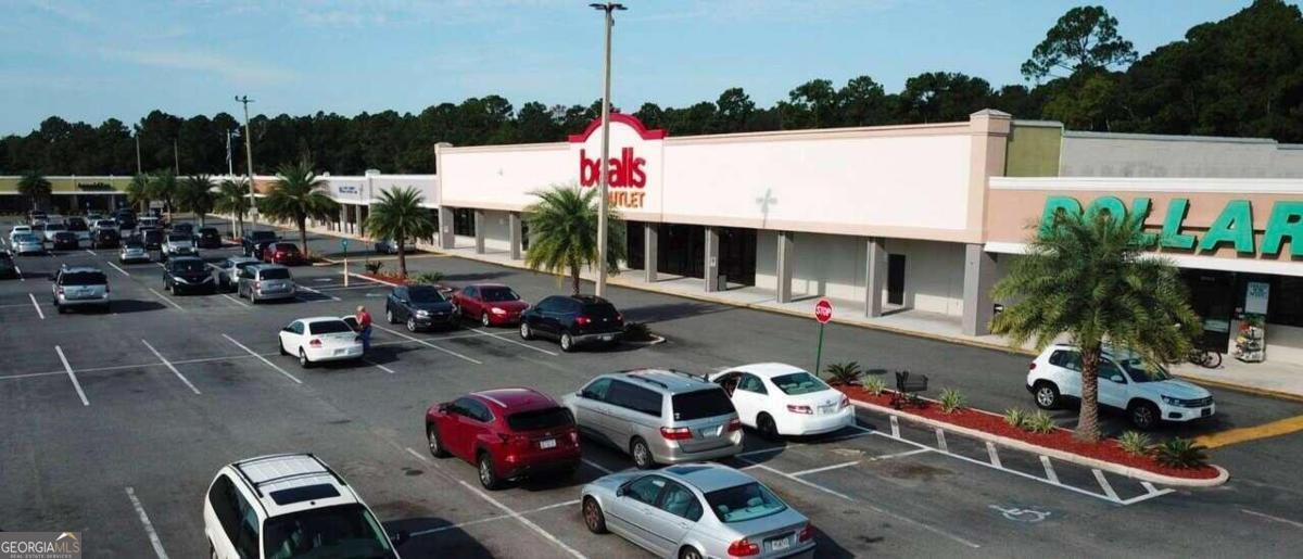 Kings Bay Village Shopping Center is a high traffic location at the signalized intersection of Georgia Highway 40 and Charlie Smith Sr. Hwy, leading to Kings Bay Naval Submarine Base. Camden County is a growing coastal community with a draw from Jacksonville, FL and Brunswick, GA. This center offers excellent parking and national brand co-tenants, Beall's, Dollar Tree, Wee Pub, PetSense and Verizon. Base rent is $14psf annual plus NNN.
