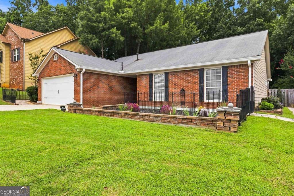 Photo of 2320 Bankston Circle, Snellville, GA 30078 (MLS # 10819216)
