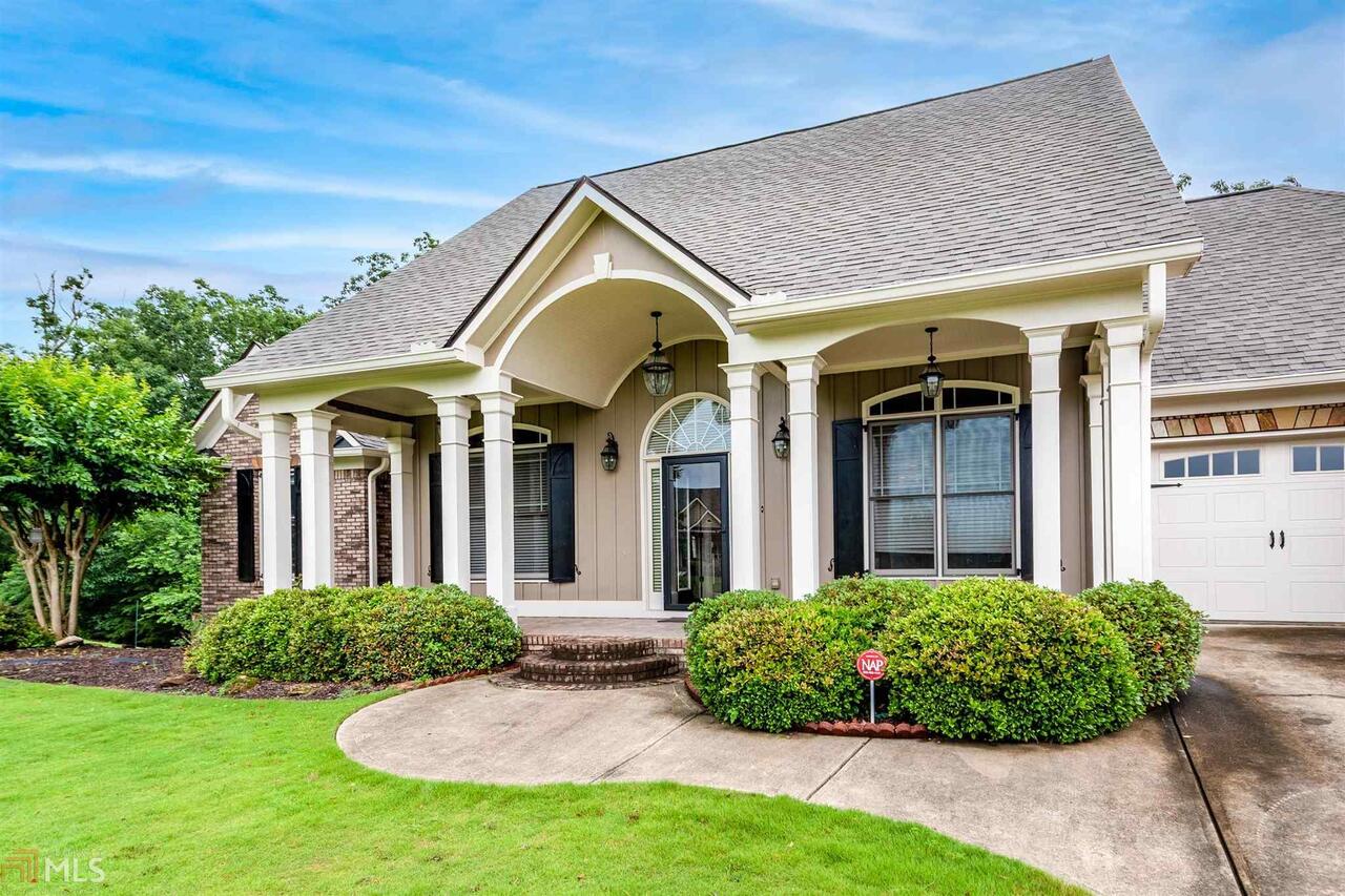 Sought after Jordans Crossing, south location in Pickens County, Ranch with mountain views!! 3 bedroom, 3 bathroom, 9 foot ceilings, trey ceilings, crown molding, hardwood flooring, Office with built in desk/ bookshelves. Great room with warm, stone FP, vented for wood burning, Glassed in sun room with mini split HVAC. Separate dining room, Kitchen w/ custom cabinetry, granite counters, walk in pantry, new roof, new HVAC, new hot water heater,Master on main w/ trey ceiling, walk in closing, Master spa w/ jetted, soaking tub, large tiled, walk in shower and spacious walk in closet. 2 car attached garage, full unfinished terrace level stubbed for a bath. Professionally Landscaped w/ terraced back yard. Generator