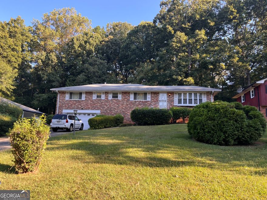 Charming ranch with big potential. "An ideal blend of location, Layout and opportunity with 3 bdrms/2ba and well-proportioned living space set on a generous lot. This FIXER UPPER is ready for your personal touches. If you are looking for an investment with upside, this is one to see. Located in the city if South Fulton, you are only minutes from major highways, Hartsfield-Jackson Airport, retail/shopping and local amenities.