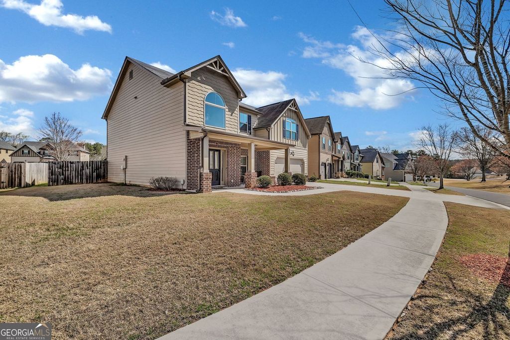 Photo of 4548 Woodgate Hill Trail, Snellville, GA 30039 (MLS # 10708338)