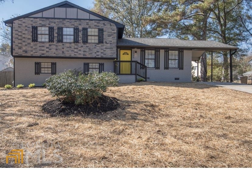 A yellow front door is associated with happiness and warmth. Gorgeously updated home with modern touches throughout. Over 2000 square feet, 4 bedroom, 2.5 bathroom split level home with no HOA will WOW you once you walk through the door, I promise you that at this price point and square footage you will not find a home in Metro Atlanta area that can compare to 2535 Hartford Drive. New laminate flooring, granite countertops, ample brand new cabinets with a lazy susan, new stainless steel over the range microwave on top of the new stainless steel SLIDE in range, new cool faucet & sink with a vegetable sprayer that comes with a sink grid to rinse of your dishes before you load them in your new stainless steel dishwasher. Ceiling fans with remote controls paired with recessed lighting in the family room and all upper level bedrooms. Once you walk up the stairs you will be wow'd by the two joining bedrooms connected by a luxurious fully tiled half bath. The owner's suite is very unique yet eccentric, with two closets, access to your luxurious fully tiled bathroom from your bedroom and guest can enter from the hallway (unless you lock it from the inside) At 2535 Hartford Drive you also have the option to make the lower level an owners suite. It has a bedroom with a full bathroom...wait ..wait it also has an additional room with a private entrance. You can use it for a home office, man/she cave, salon, daycare, in-law suite, teen suite or even AIRBnB. This home is loaded with endless possibilities. The two full baths have new vanities,with new sinks, new faucets, new toilets, new lighting and the same with half bath except for the bathtub. I'm out of breath so I won't mention the huge backyard that houses a large entertaining sized deck, the front yard was recently seeded with rye & fescue grass seeds. Open House Saturday December 4th 2021 from 11:00 a.m.until 1:30 p.m.