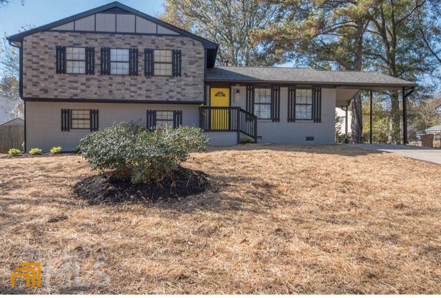A yellow front door is associated with happiness and warmth.  Gorgeously updated home with modern touches throughout.  Over 2000 square feet, 4 bedroom, 2.5 bathroom split level home with no HOA will WOW you once you walk through the door, I promise you that at this price point and square footage you will not find a home in Metro Atlanta area that can compare to 2535 Hartford Drive. New laminate flooring, granite countertops, ample brand new cabinets with a lazy susan, new stainless steel over the range microwave on top of the new stainless steel SLIDE in range, new cool faucet & sink with a vegetable sprayer that comes with a sink grid to rinse of your dishes before you load them in your new stainless steel dishwasher. Ceiling fans with remote controls paired with recessed lighting in the family room and all upper level bedrooms. Once you walk up the stairs you will be wow'd by the two joining bedrooms connected by a luxurious fully tiled half bath. The owner's suite is very unique yet eccentric, with two closets, access to your luxurious fully tiled bathroom from your bedroom and guest can enter from the hallway (unless you lock it from the inside) At 2535 Hartford Drive you also have the option to make the lower level an owners suite. It has a bedroom with a full bathroom...wait ..wait it also has an additional room with a private entrance. You can use it for a home office, man/she cave, salon, daycare, in-law suite, teen suite or even AIRBnB.  This home is loaded with endless possibilities.  The two full baths have new vanities,with new sinks, new faucets, new toilets, new lighting and the same with half bath except for the bathtub.   I'm out of breath so I won't mention the huge backyard that houses a large entertaining sized deck, the front yard was recently  seeded with rye & fescue grass seeds.   Open House Saturday December 4th 2021 from 11:00 a.m.until 1:30 p.m.