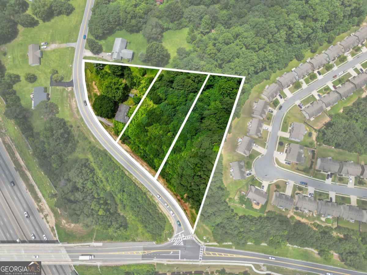 Exceptional opportunity in Buford's sought-after Seckinger Cluster. Zoned R-100 and ready for immediate development, this property supports three single-family homes with sewer access at the rear. Ideal for builders or buyers looking to create a private estate. Just minutes from I-85, Mall of Georgia, parks, and top schools. Surrounded by new construction and 2 million-dollar homes. Served by Ivy Creek Elementary, Jones Middle, and Seckinger High (Georgia's first AI-themed high school with STEM, arts, and tech-focused programs). Rare to find shovel-ready land in a premium school district with strong resale demand. Existing home has no value and will need to be demolished. Seller is a developer and can assist with the building process. Open to creative deal structures.