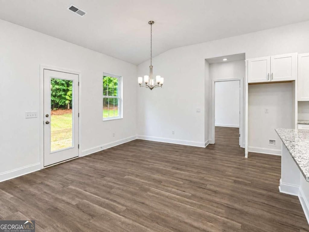 Photo of 1850 W Mcintosh Road, Griffin, GA 30223 (MLS # 10843492)