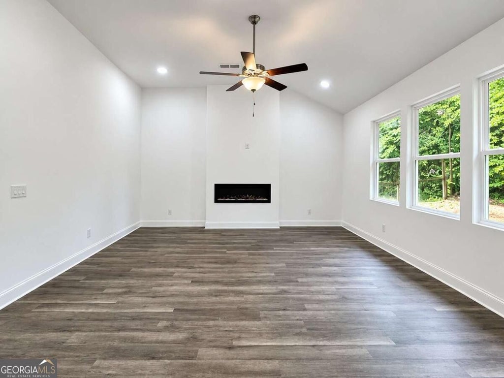 Photo of 1850 W Mcintosh Road, Griffin, GA 30223 (MLS # 10843492)