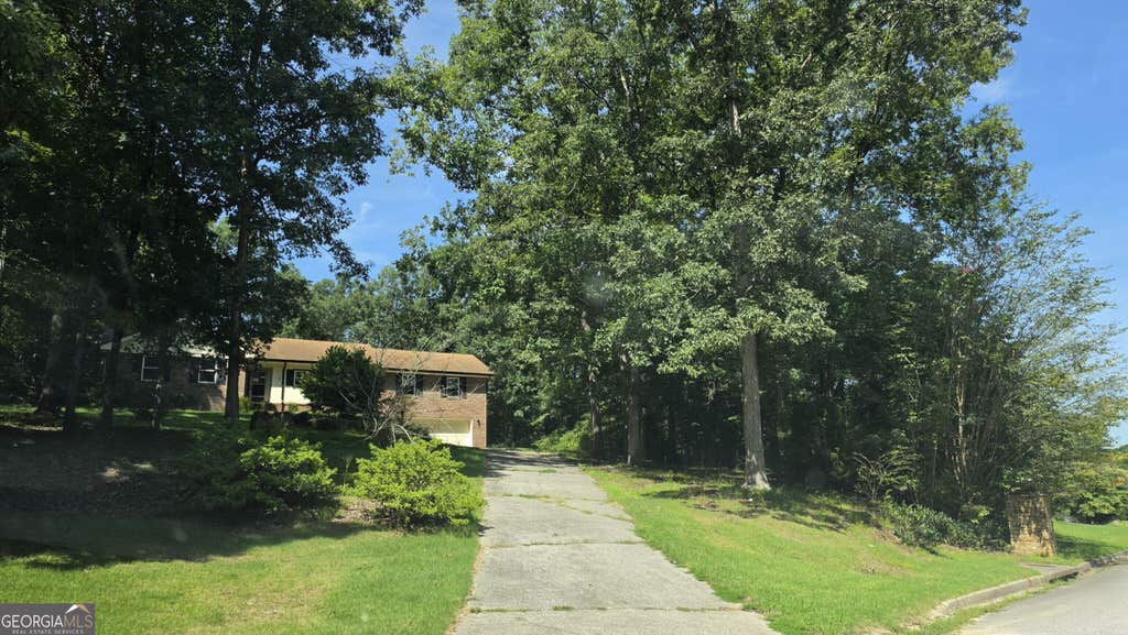 Photo of 2206 Lost Forest Lane SW, Conyers, GA 30094 (MLS # 10831688)