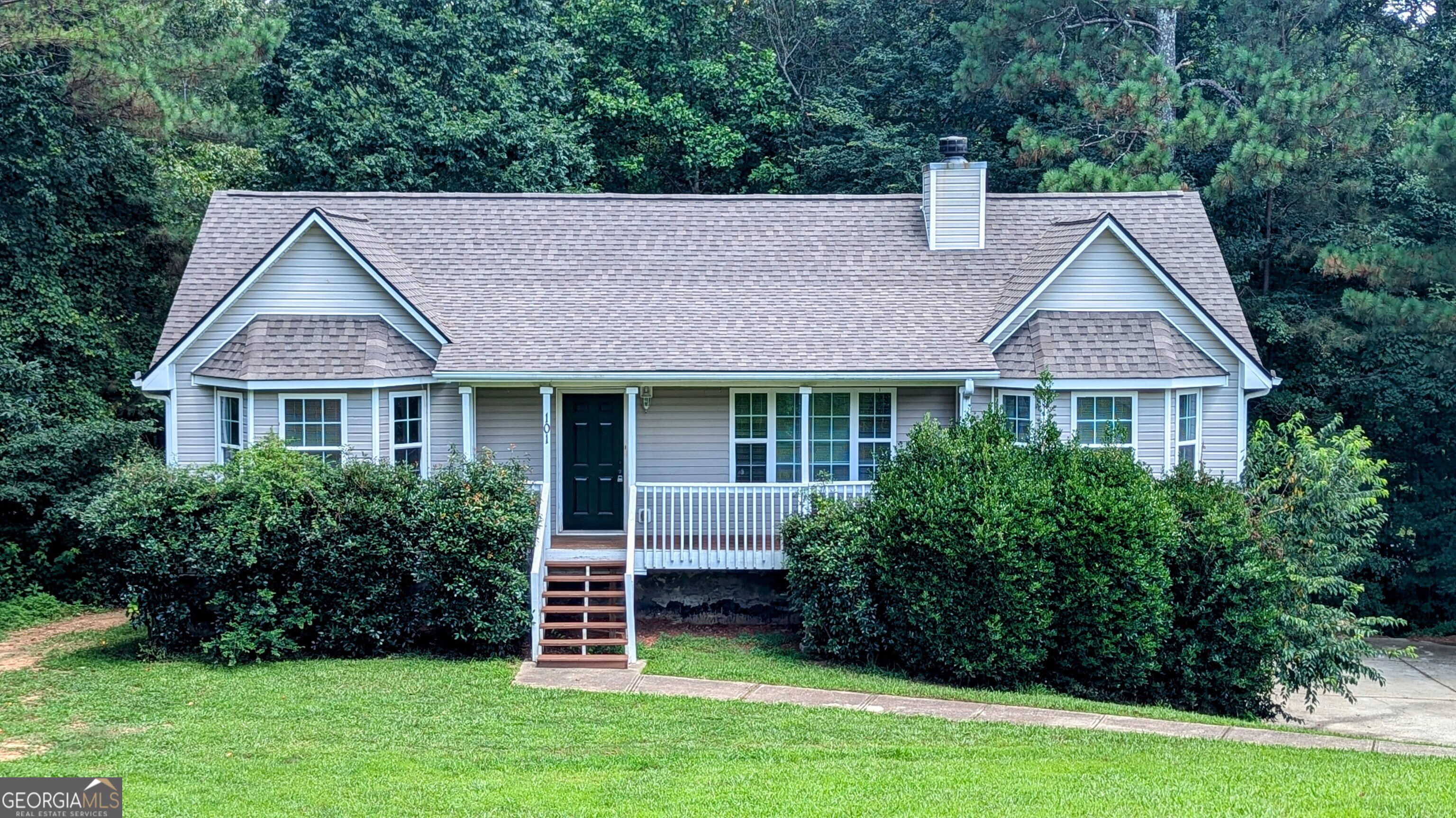 Welcome to this charming 3-bedroom, 2-bathroom split-level home nestled on a spacious lot with mature landscaping. Inside, you'll find a bright living room with vaulted ceilings, updated flooring, and a cozy fireplace. The kitchen offers plenty of cabinet space, a double sink, and a view into the living area. The primary suite features a bay window, tray ceiling, and a private bath with a jetted tub and separate shower. Downstairs includes a bonus room, laundry area, and access to the 2-car garage. Step out back to enjoy a peaceful deck-perfect for relaxing or entertaining. FHA and USDA loans welcomed! Agents: Please read private remarks/look at the offer guidelines in docs before calling, it should answer all questions you have.