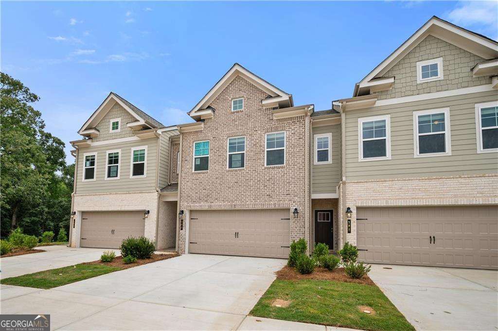 Photo of 214 Abbotts Crossing Circle, Conyers, GA 30094 (MLS # 10695719)