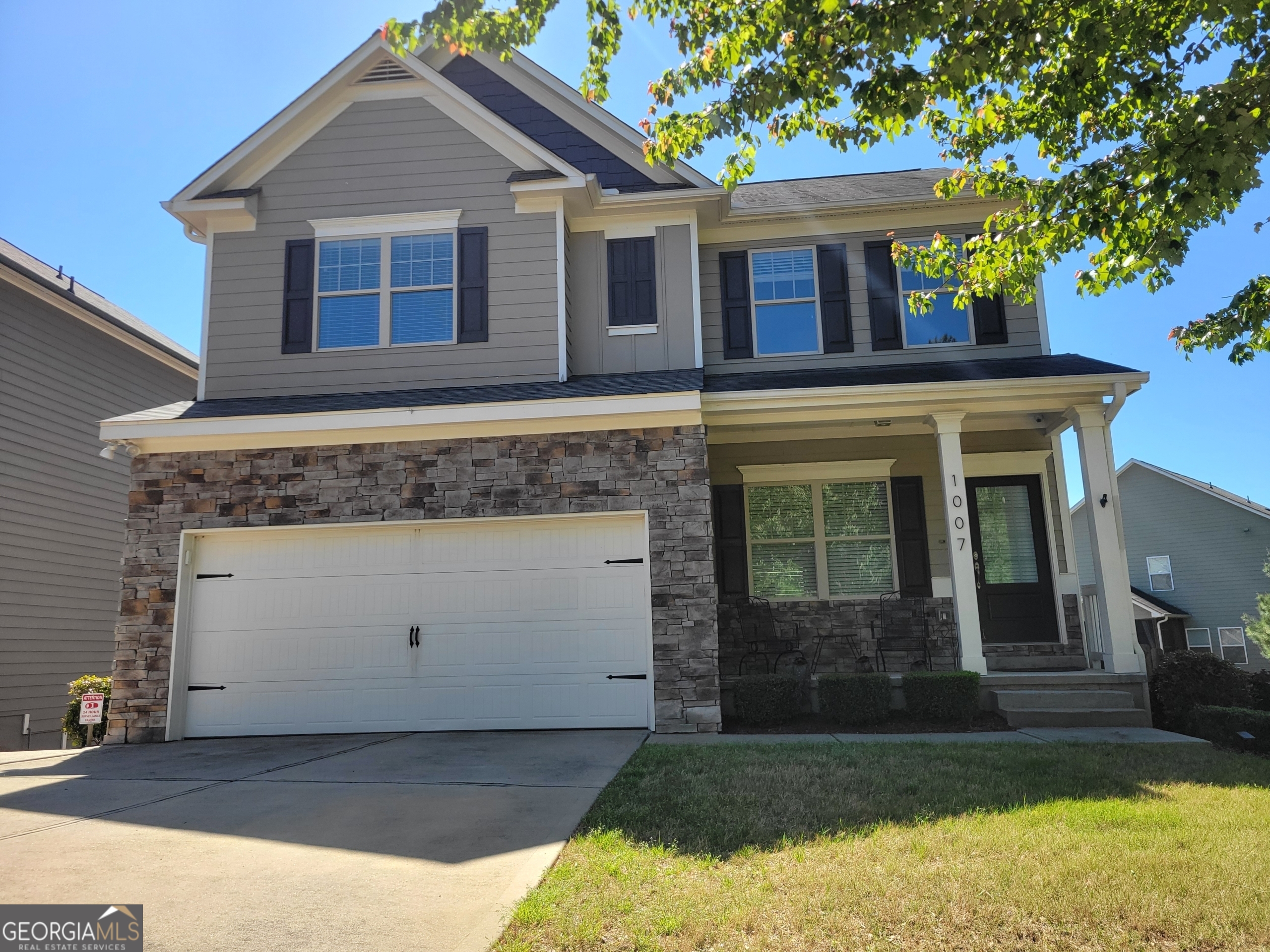 This exceptional 3049sf (approx) 4BR 3 1/2 BA home is located in Water's Edge at River Park. It has the largest fenced lot in the subdivision (.26 acre), and is safely located on a cul-de-sac, adjacent to dedicated forested greenspace. Construction was completed in 2017, and the new owner fully gutted the brand new house, replacing all builder grade components with "custom home spec" quality items. All lighting and plumbing fixtures, toilets, and all hardware on all doors and cabinets are high-end. These upgrades exceeded $60,000.00. Kitchen appliances were replaced with Frigidaire Gallery Collection. Microwave was custom installed to vent to the outdoors, not into the kitchen. Refrigerator is included. Beautiful granite countertops and kitchen island. The master bath features a $15,000 custom-built Ritz-Carlton styled walk-in 9-foot-wide tiled double shower. Sony flat panel TVs and soundbars, washer and dryer are included. The garage was heavily modified to increase square footage in 2021 at a cost of $15,000. It is the only garage in the subdivision big enough to park a full sized pickup truck inside. Extensive heavy overhead shelving ($1500) adds massive storage area. Basement was fully finished at a cost of $75,000.00. It contains one full bath, and is set up to be a Man-Cave/Bicycle Shop/Workshop. It has a brand new HVAC system. Two 65" TVs are included in the sale. One of the bedrooms was converted into a home yoga studio. It has laminate hardwood flooring, and floor to ceiling mirrors on 3 walls. Window looks out into the forest. This room is still fully suitable as a kid's room or home office. Cost was $5,000.00. The house is prepared for disasters. It has the only true wood burning fireplace in the subdivision. It is fitted with gas logs, but can be converted to wood in 5 minutes in case of emergencies. The rear of the house has a covered deck with retractable curtains and a stairwell down the back yard. These upgrades were another $8000.00. The back side of the house has an attached integrated storage shed. Cost was $4,000.00. The primary feature of the back yard is a spectacular hardscape with an outdoor fireplace and waterwall feature. The entire patio is covered in lovely custom stonework. This hardscape cost over $70,000.00. It has just been fully retreated with color enhancing stone sealer. The backyard has a massive raised-bed vegetable garden with irrigation. It can provide an enormous amount of food for a family. Cost of installation was $15,000.00. The house is "dog friendly" and has a series of dog doors throughout the house to allow your pet(s) to go to the yard any time they desire. There is an outdoor bicycle/dog/equipment wash station. The house is "move in ready" and needs no repairs. It has new carpeting and fresh paint on all woodwork. All picture nail holes and screw/nail pops have been repaired and touched up. The backyard has a very clean older hottub that works but has quirks. It has a new skin on the lid. It is "FREE" with the sale, or can be removed if the buyer is not interested in it. The house has extensive personal security and preparedness features that cost over $40,0000 and will only be revealed to a buyer ready to make an offer. These features cannot be publicly revealed in order to protect the future owner. The subdivision has VERY affordable HOA fees of $110 per month which includes mowing all of the grass in the large back yard, trash, and sewer. There is a Master Association at which is $55 per month and includes huge swimming pool, playgrounds, tennis courts, exercise gym, etc.