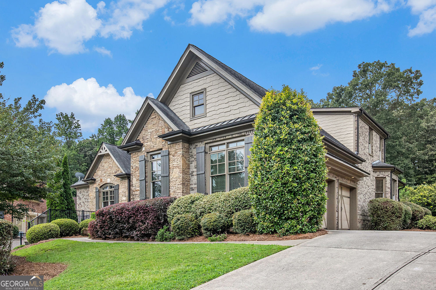 Luxurious Living in Buford's Springbluff Community Welcome to 2953 Springbluff Lane, five beds, four baths, a beautifully updated and luxurious residence in one of Buford's most desirable subdivisions. Every detail has been refreshed for modern elegance-refinished and sealed hardwood floors, freshly painted interior and trim, updated exterior trim, a fully redone and sealed deck, new carpet upstairs, and a brand-new AC unit for year-round comfort. Step inside to a warm and inviting layout. A formal dining room greets you to the right, alongside a flexible office/bedroom with an ensuite-ideal for guests, parents, or a nursery. The owner's suite on the main level is a true retreat, boasting a supersized bedroom, a spa-inspired Jacuzzi soaking tub, and dual oversized walk-in closets. Designed for both comfort and style, this home offers two family rooms-one overlooking the kitchen for everyday gatherings, and the other opening onto a private deck for effortless entertaining. Upstairs, you'll find three spacious bedrooms and a cozy loft. One bedroom enjoys its own private bath, while the other two share a luxurious Jack & Jill bathroom with separate vanities for convenience. The unfinished basement offers endless possibilities-whether you opt for storage, Entertainment, or finishing it for instant equity, the space is yours to design. All of this is set within the Springbluff community, known for its welcoming atmosphere and prime Buford location close to top-rated schools, shopping, dining, and easy access to major highways. Don't miss the opportunity to make this luxurious home your own.